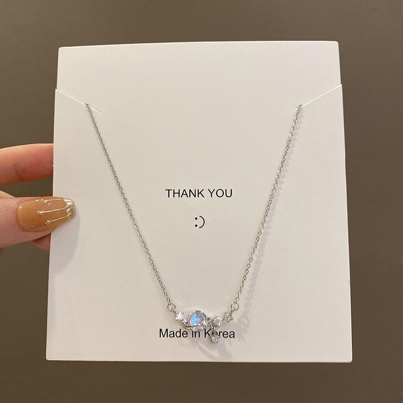 Around the planet titanium steel necklace women s niche design sense slightly inlaid zircon pendant cold wind match