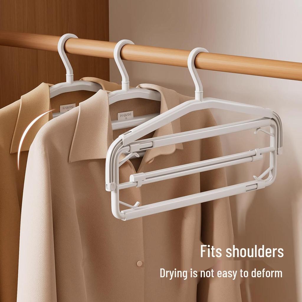 Telescopic Non-slip Clothes Rack: Windproof, Ideal for Hanging Towels, Bed Sheets, and Duvet Covers.