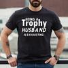 BEING A TROPHY HUSBAND IS | FUNNY | NOVELTY | JOKE | MEN'S T-shirt Tee Top