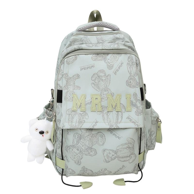 The new bear graffiti backpack has a large capacity of foreign style tide and a couple of middle and high school students have a class backpack tide.
