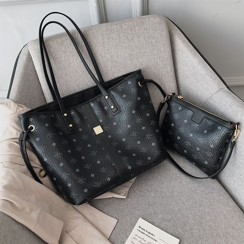 

Hong Kong Leather Tote Women s 2024 New Arrival Presbyopic Shoulder Large Capacity Commuter Tote Handbag Mother and Child Bag Black(Send puppy pendant)