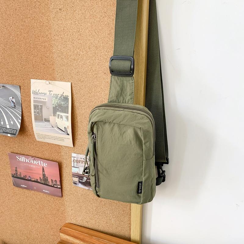 Simple trend casual personality men's breast bag Japanese light shoulder small backpack women's leisure sports messenger bag