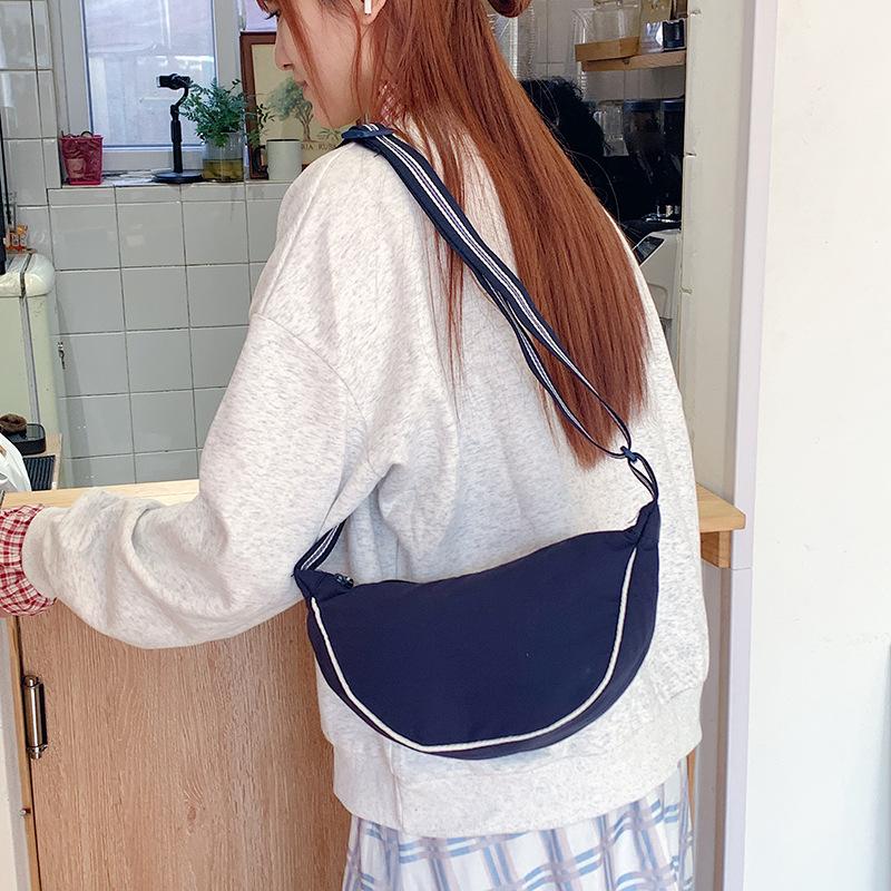 Fashion Harajuku style simple contrasting colors women's dumpling bag spring new commuter travel shoulder messenger bag