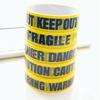 Dekoratives Warnband: Schwarze Schrift auf gelbem Hintergrund, 2,4 cm breit, 25-m-Rolle