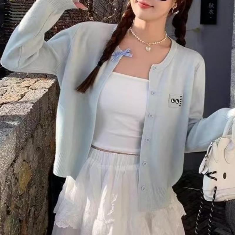 Simple knitted cardigan early autumn new women's clothing design sense long sleeve soft waxy versatile short top