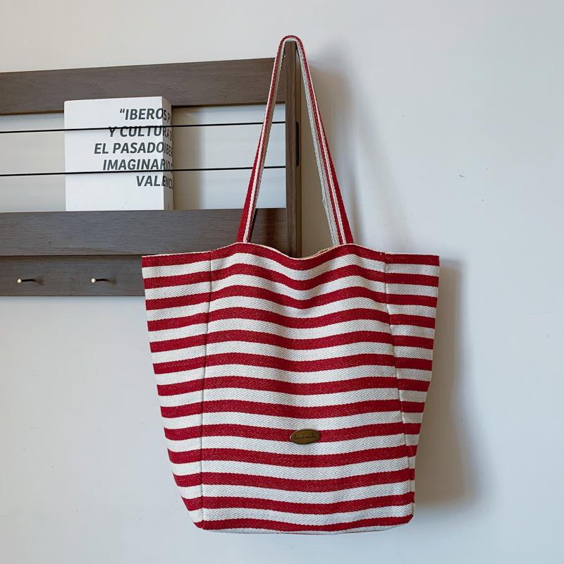 Gestreifte kontrastfarbene Canvas-Tasche 2025 neue koreanische Ins-Freizeittasche einzelne Schulter große Kapazität Tragetasche Einkaufstasche