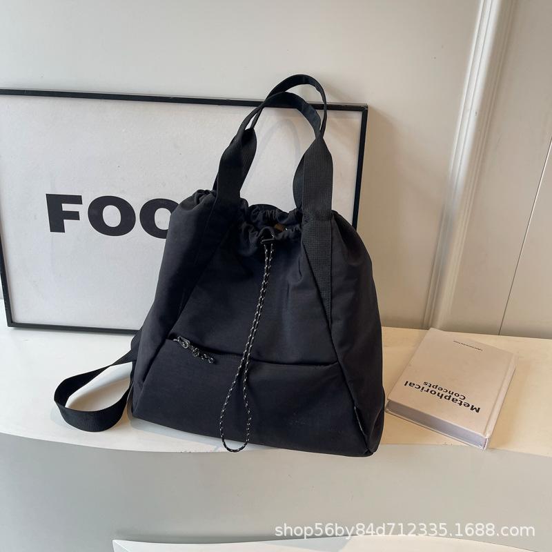 Fashion and leisure large-capacity tote bag women's 2025 spring portable versatile canvas bag multi-pocket shoulder bag