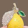 Women Brooch Sparkling Rhinestones Small Lemon Shape Lapel Pin Suits Coats Bags Scarves Badge Versatile Accessory