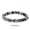 She Yao Natürlicher Kristallachat Tigerauge Armband - Modeschmuck mit einzelnen runden Perlen