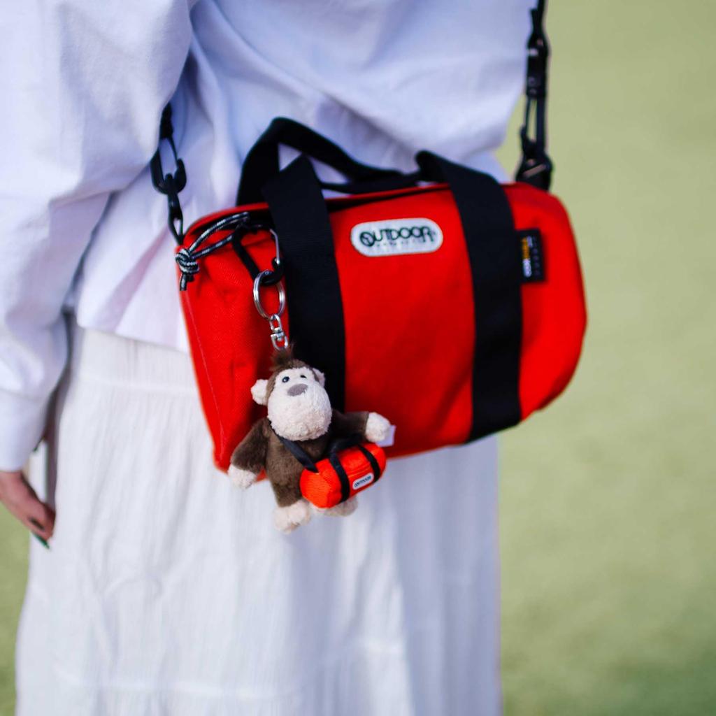 NICI OUTDOOR PRODUCTS Keychain Monkey 10cm Roll Boston Orange Keyring Plush