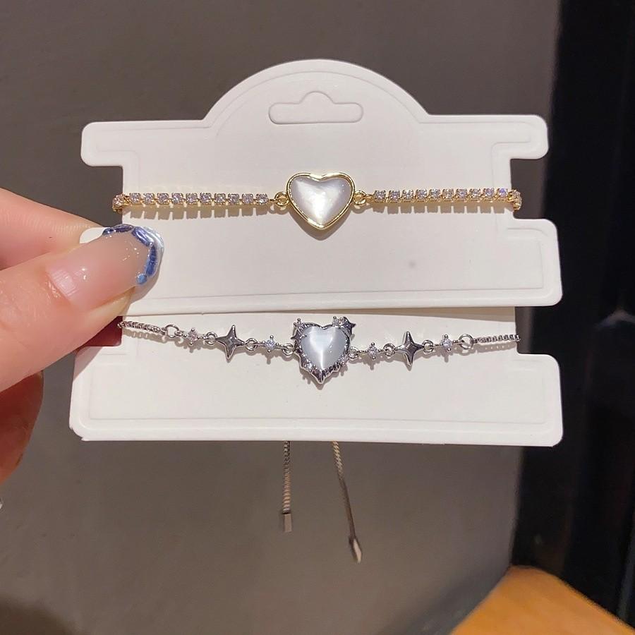 Modisches Herzförmiges Cz Stern Liebe Katzenauge Armband Mit Mikroeingefasstem Kupfer Für Damen Freizeitkleidung