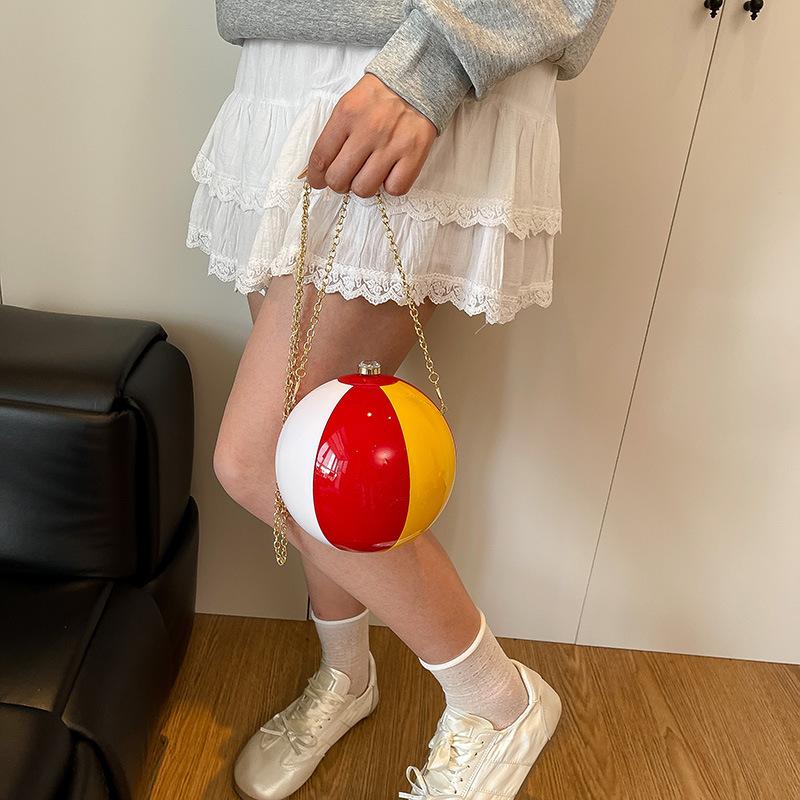 Personalized and creative football bag 2025 new European and American acrylic dinner bag women's contrasting color shoulder chain small round bag