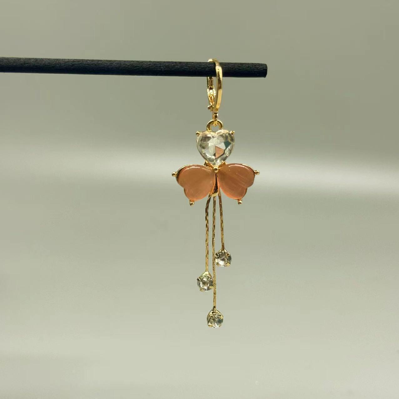 

2024 Элегантные серьги-кисточки с клевером: Нишевый, шикарный дизайн для весны/лета золотой/розовый