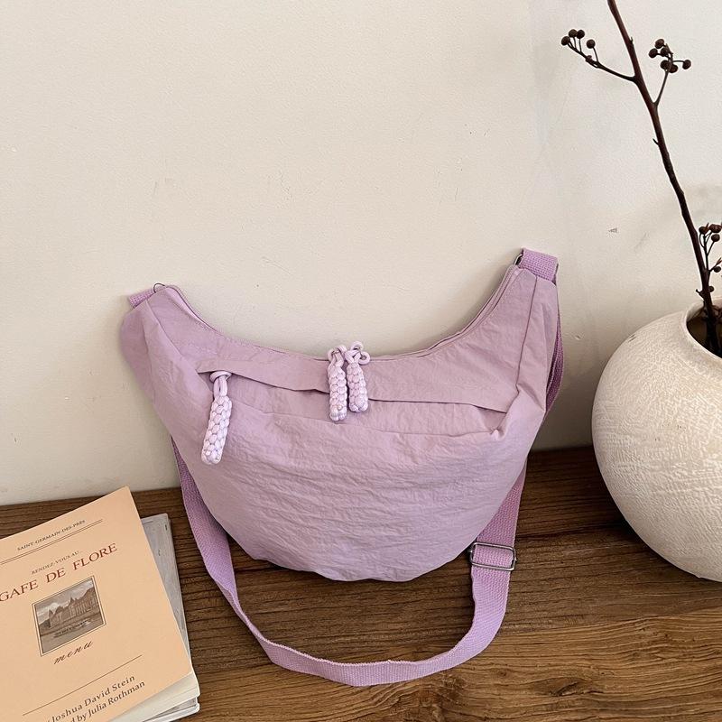 Korean version of high-value fashion solid color dumpling bag spring new simple shoulder bag casual nylon messenger bag