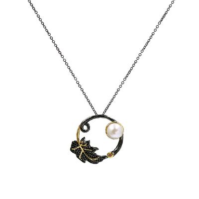 Collana etnica per donna Collana con ciondolo foglia d'oro stile Collana in oro bicolore con gioielli in oro nero Squisita catena di maglione di lusso