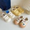 Children's open smile biscuit shoes spring and autumn new boys and girls ins board shoes soft sole versatile baby canvas shoes tide