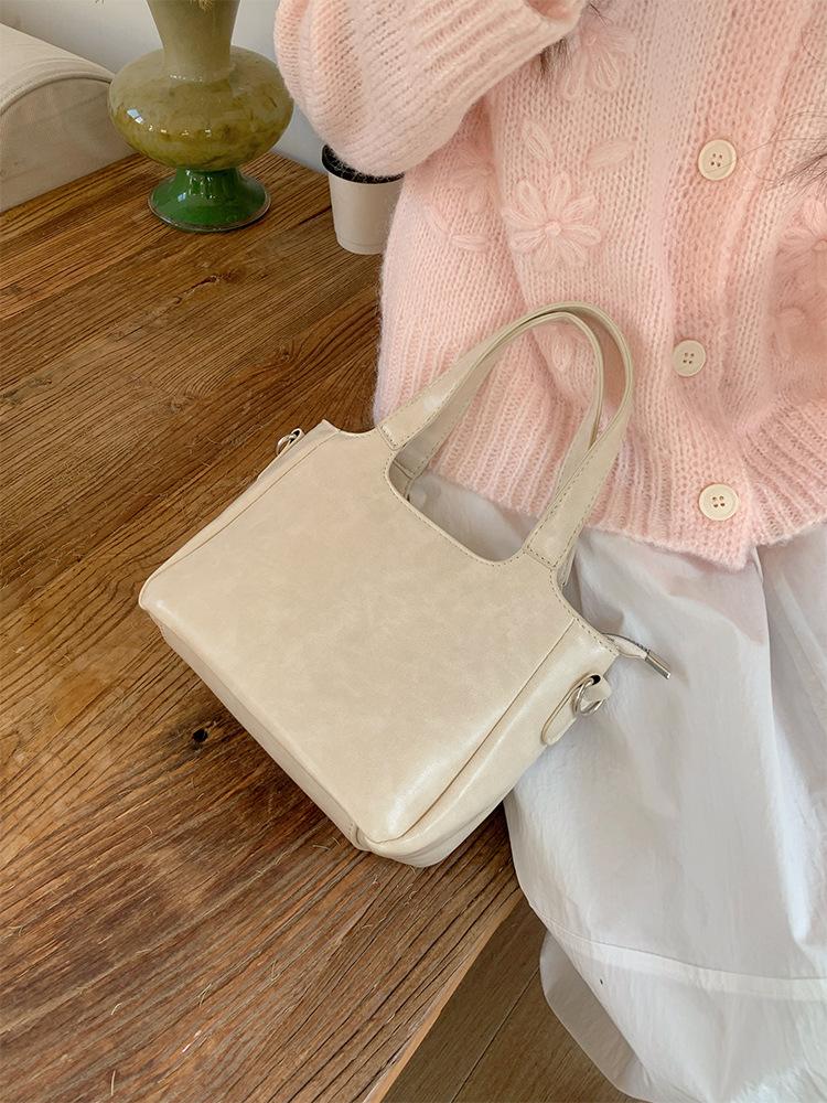 Summer fresh and simple bucket bag for women 2025 new solid color commuting shoulder bag, hand-held vegetable basket crossbody b