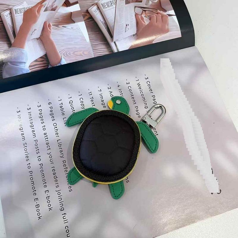 2025 New Leather Pendant Head Layer Leather Mini Earphone Bag Turtle Pendant Wallet Cross Border