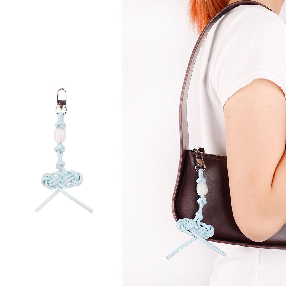 MIU series creative color hand-woven ruyi knot pu leather cord accessories bag pendant keychain