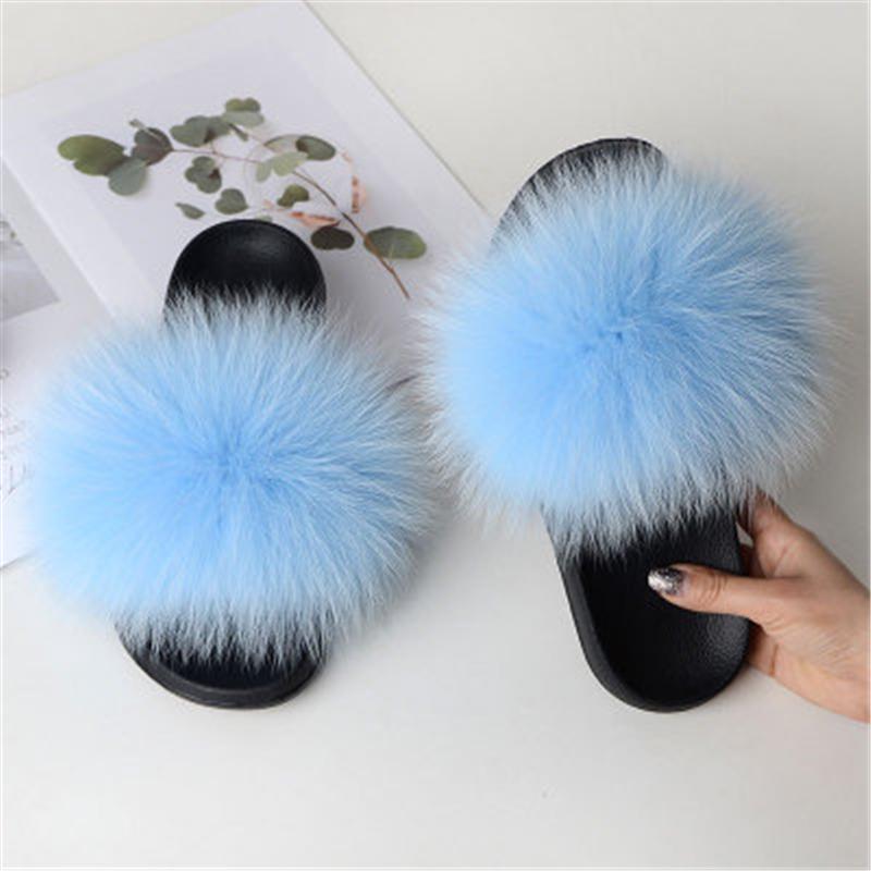 light blue fluffy slippers