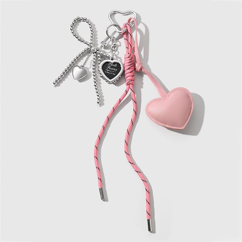 Heart-Shaped Leather Pendant Keychain with Bow and Silver Bead Charm