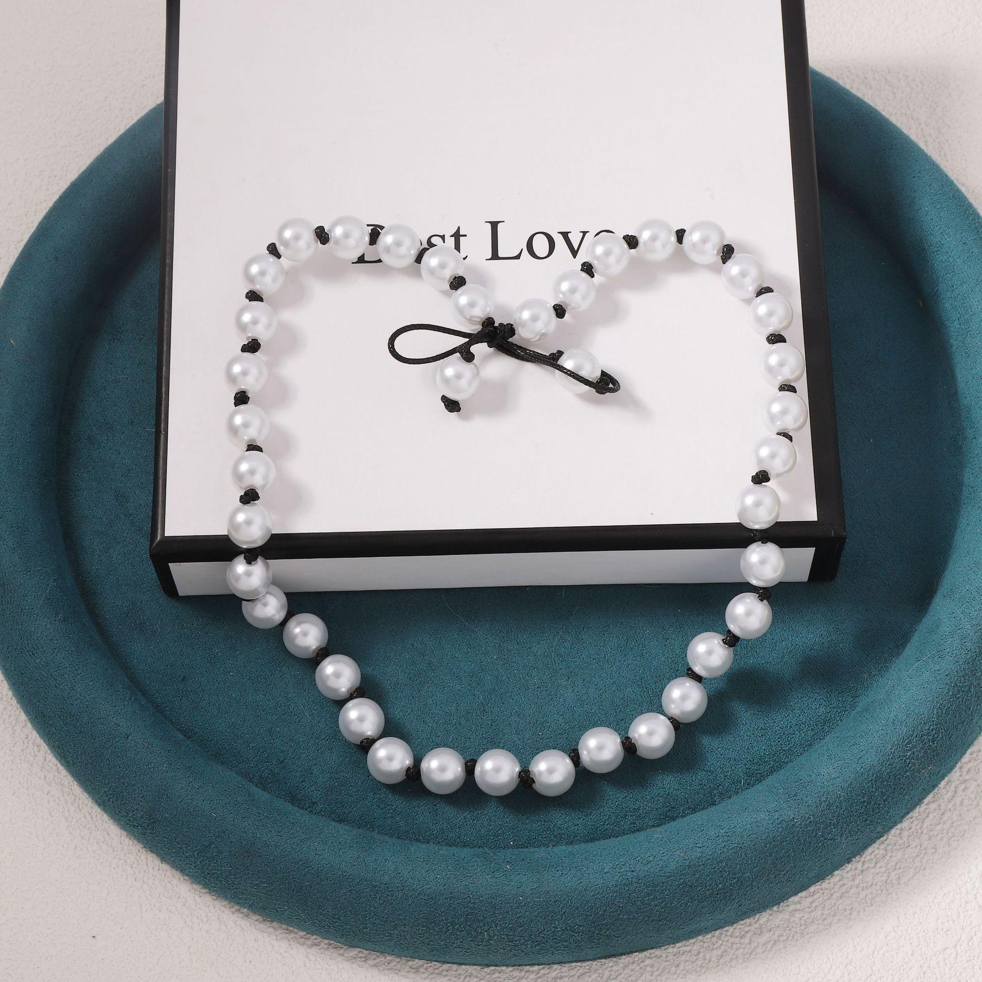 European and American light luxury high-end design imitation pearl hand-beaded bow necklace bracelet two-piece set
