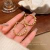Times Come and Go, Transfer Bead Earrings, Women's Cold Wind Niche Gold Earrings, High-end Light Luxury Earrings.