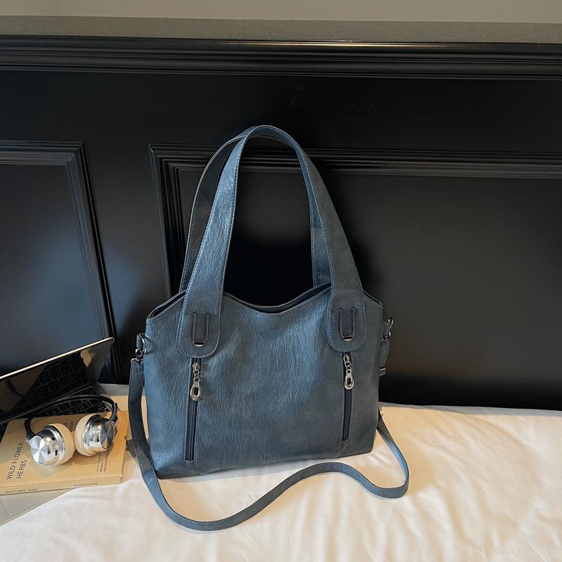 

2025 summer new fashionable large-capacity tote bag casual portable shoulder large bag high value simple bag women синій