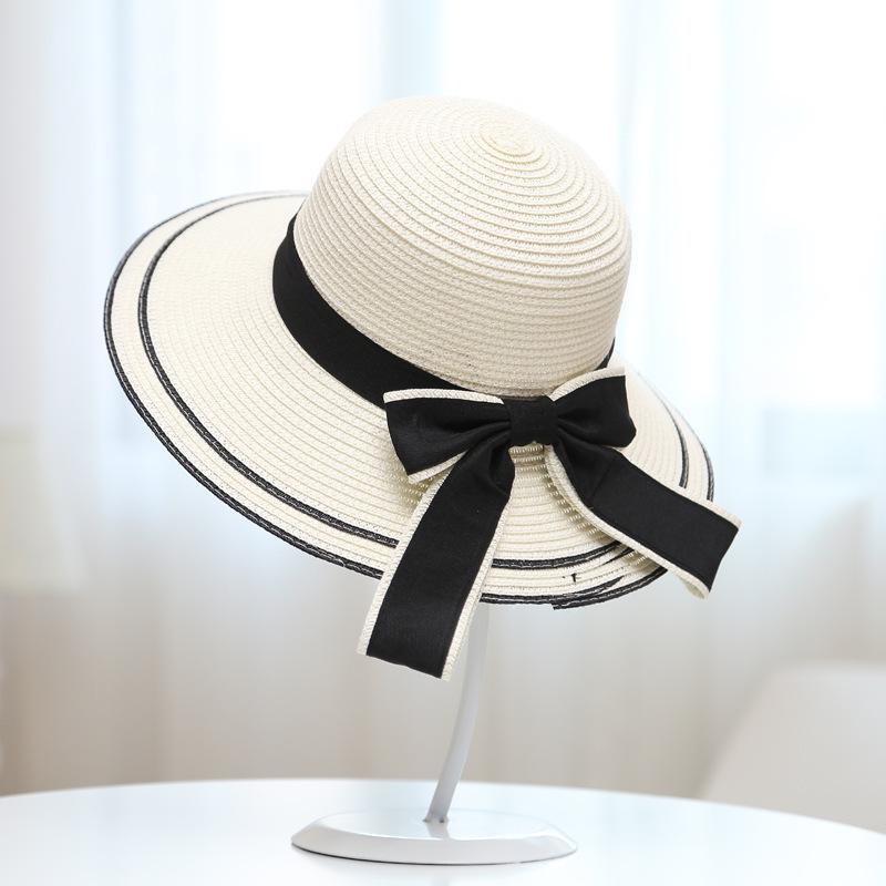 Women's Korean-style straw hat with large brim and bow, face-shading sun hat for outdoor beach use, UV protection, sun-proof straw fisherman hat