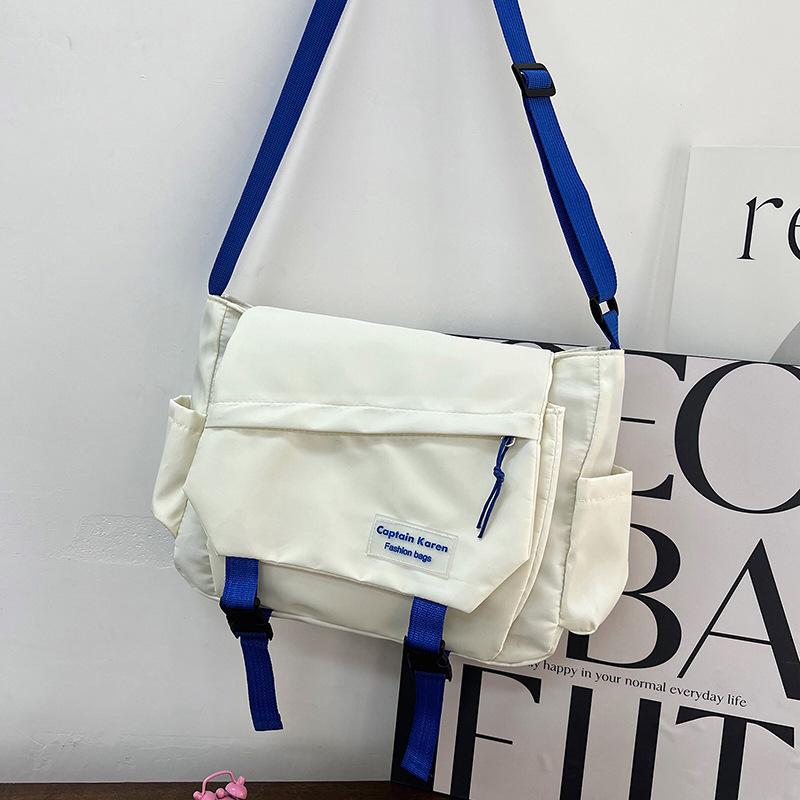 Large capacity tooling multi-pocket messenger bag leisure student shoulder versatile messenger bag solid color anti-splashing women's bag