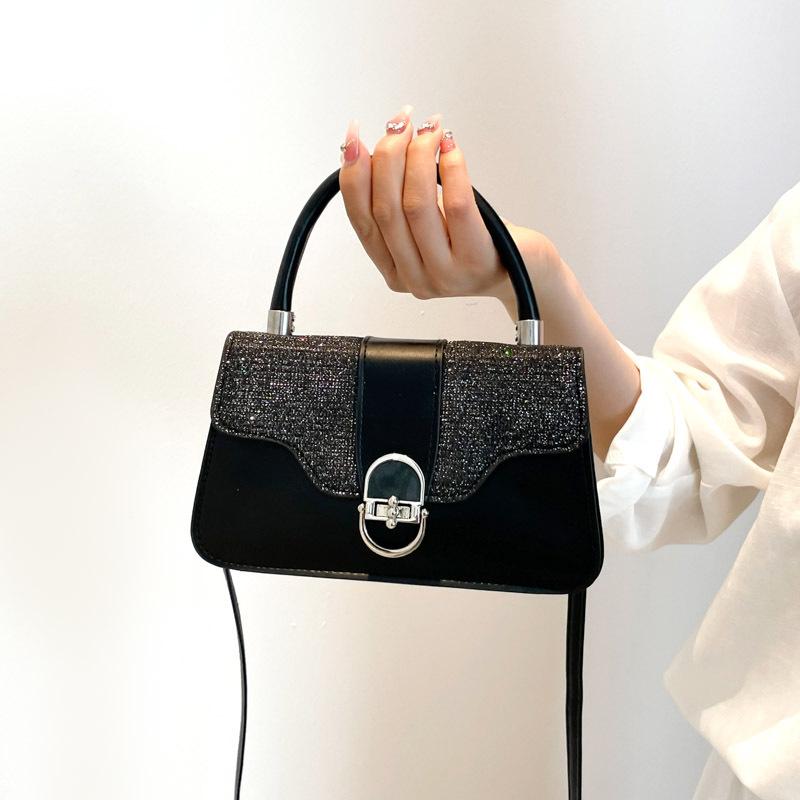 

Высокая мода лето новая маленькая квадратная сумка женская личность кэжуал нишевый дизайн текстура темперамент зарубежный стиль сумка-мессенджер чёрный