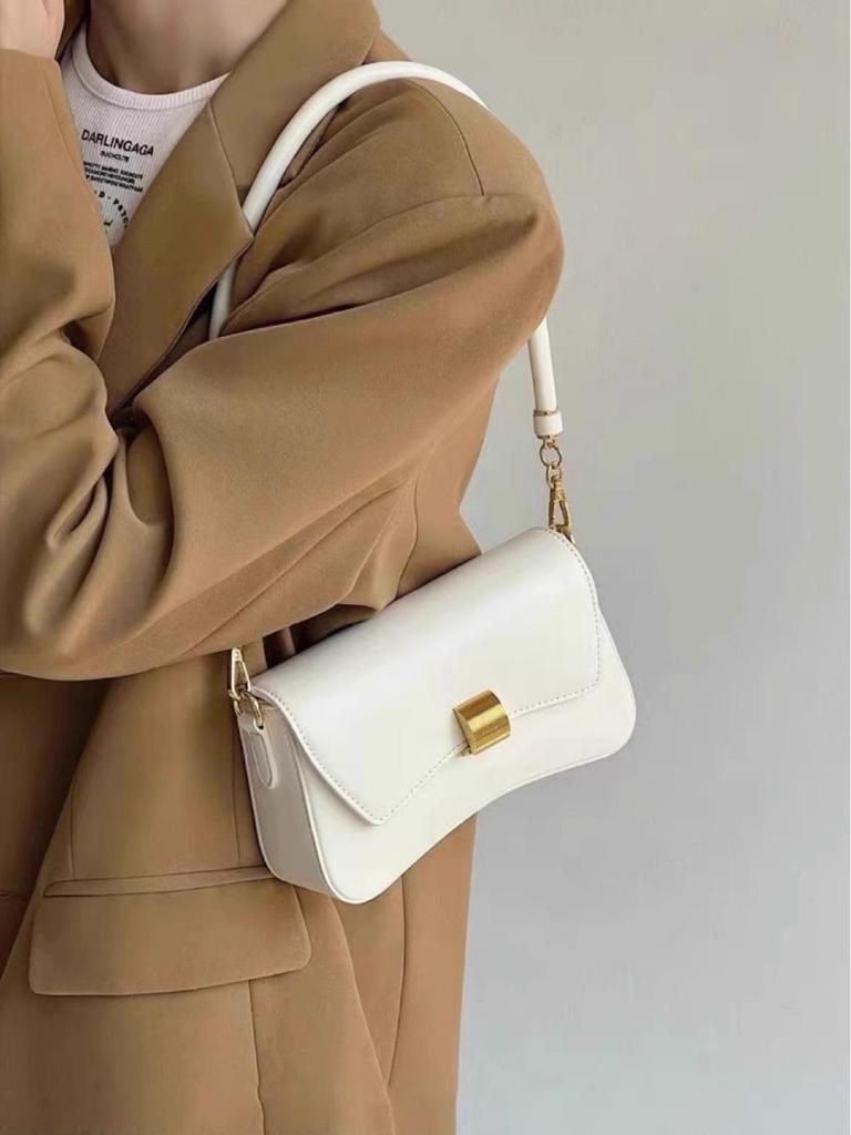 Retro 2026 Women's Baguette Bag: High-End Niche Design, Shoulder & Crossbody Style, Compact and Stylish