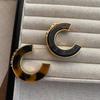 Niche unique design leopard print circle ear buckle fashionable light luxury high-end earrings European and American exaggerated atmosphere earrings