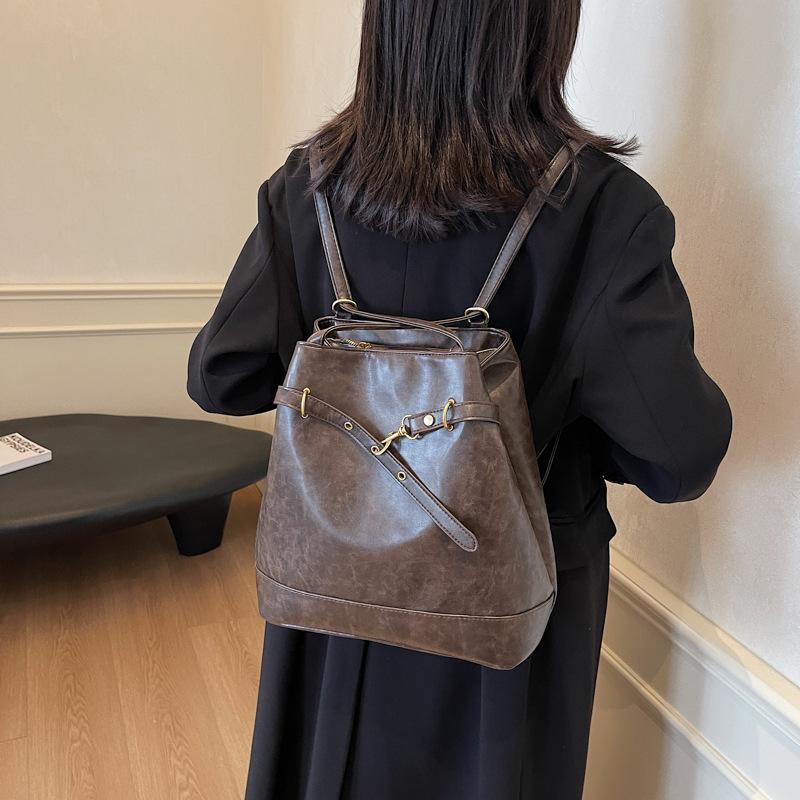 2025 autumn and winter new personalized retro smudge high-end sense one pack multi-back deformation bucket backpack messenger bag tide