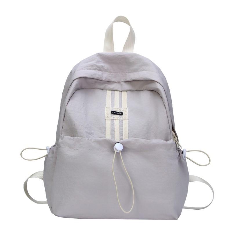 

Outdoor sports bag new simple and versatile lightweight backpack leisure travel junior high school college student sports backpack сірий колір