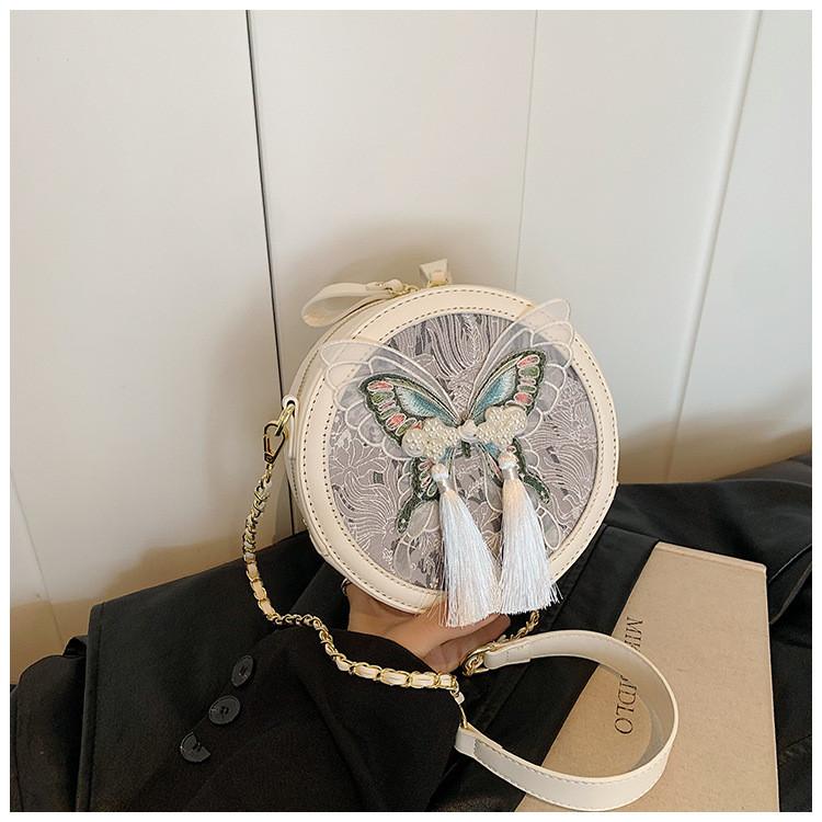 Chinese Fashion Small Round Pu Bag With Tassels And Internal Zipper Pocket For Women