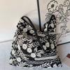 IELGY Flax embroidered flowers shoulder tote bag Joker simple literature and art in spring and summer.