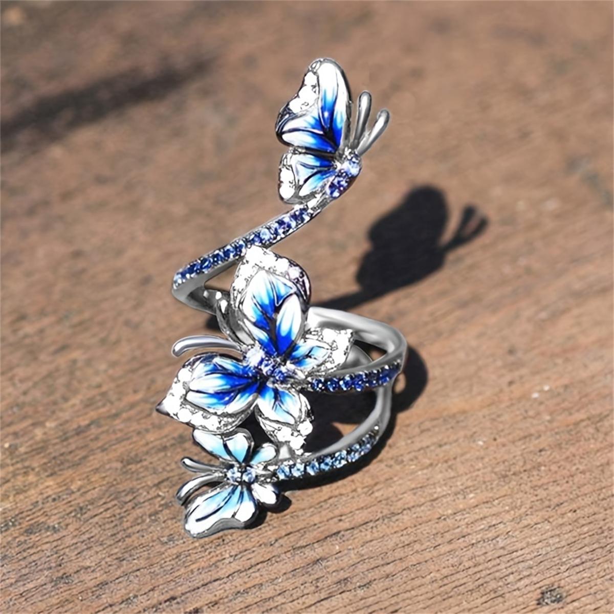 Очаровательное синее обручальное кольцо с бабочкой — фото 3