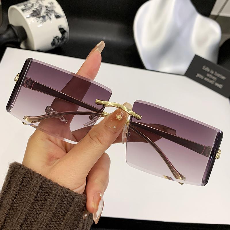 

New Curved Lens Leopard Head Metal Frameless Edge Cutting High-quality Sunglasses 90300