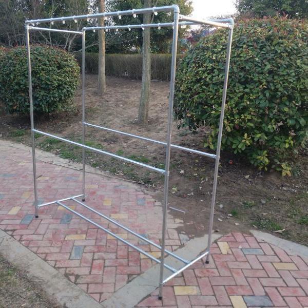 Steel Pipe Double Rod Clothes Drying Rack for Quilts and Household Balcony Use.