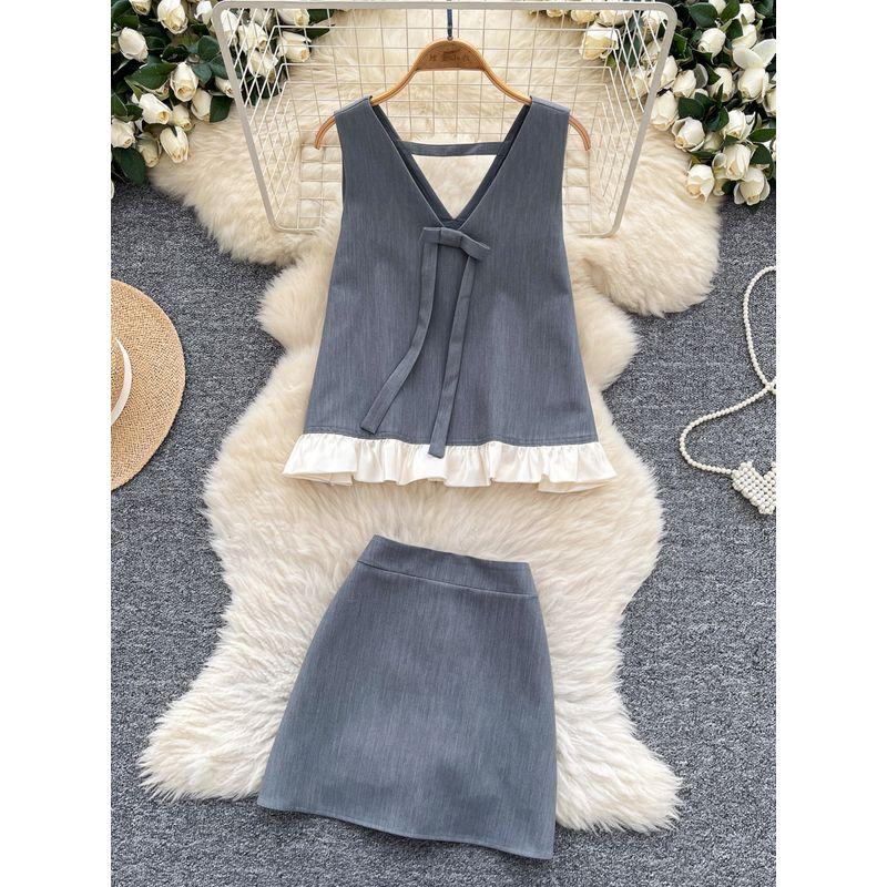 Online Celebrity Ins Niche Popular High-Grade Sense Summer Clothing Two-piece Set Sleeveless Loose Bow Vest High Waist Skirt