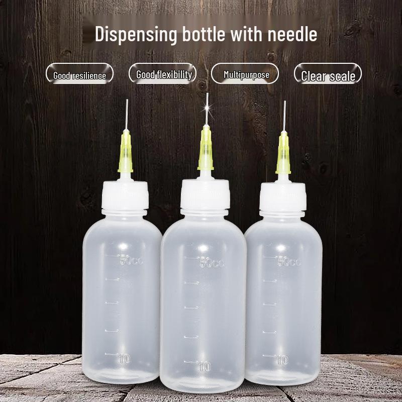 

Маленький прозрачный мягкий пластиковый флакон с игольчатым наконечником для дозирования клея, масла и эмульсий