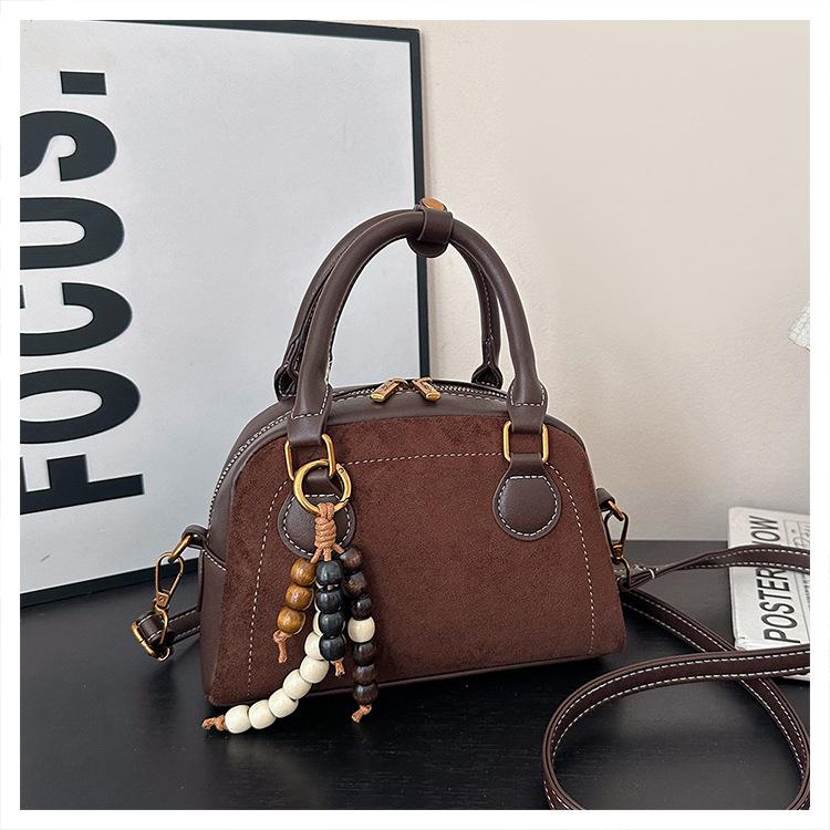 

Popular Versatile Handbag for Women, New Niche Retro Soft Leather Bowling Bag, Fashionable Crossbody Single Shoulder Bag