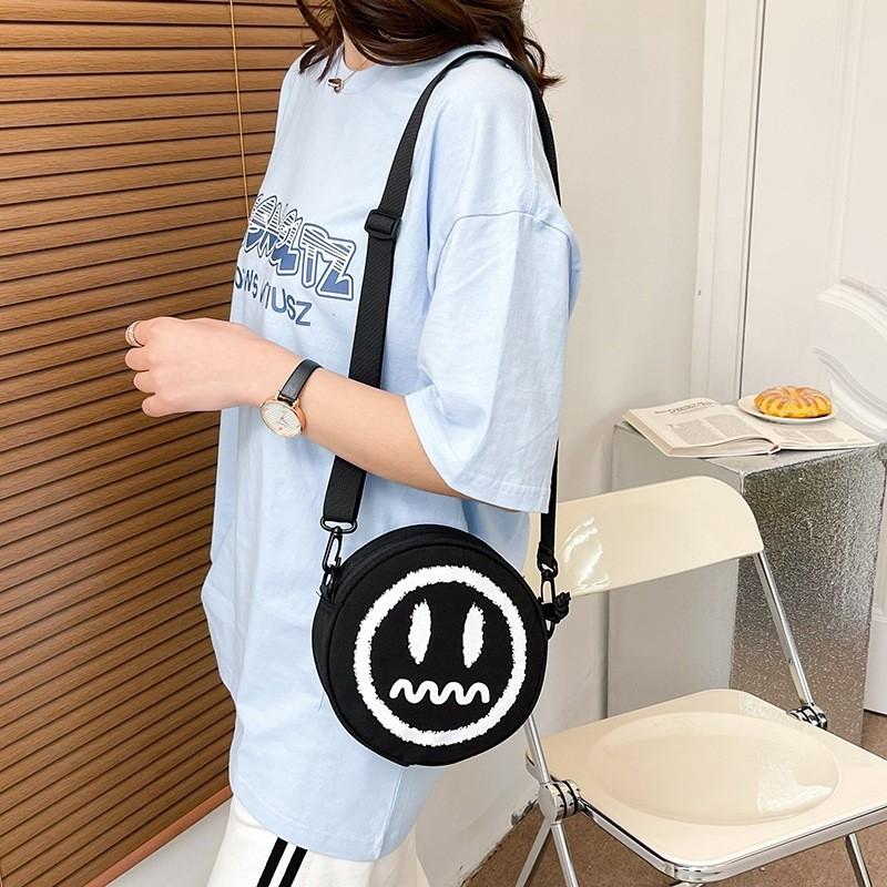 Trendy And Stylish Black Oxford Fabric Round Bag For Women With Soft Shoulder Strap