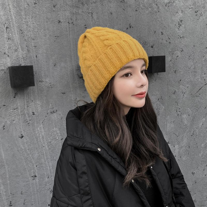 Classic versatile hat women's autumn and winter tide warm thickened ear protector winter women's foreign style knitted wool hat