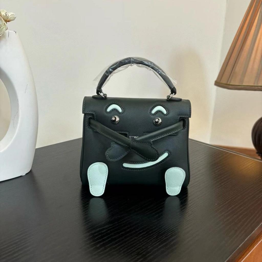 Borsa a faccina sorridente nuova per la primavera e l'estate 2025 borsa Kelli mini in pelle bovina di primo strato di alta gamma borsa a tracolla carina da millenial