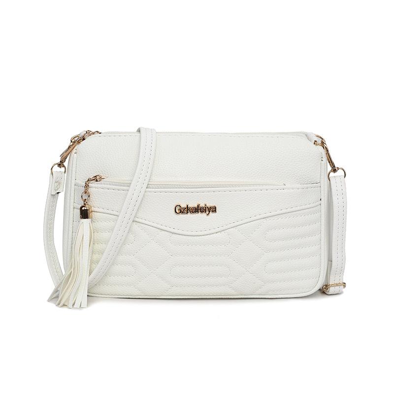 

Retro commuter fringed bag autumn and winter new large-capacity fashion shoulder underarm bag high-end versatile diagonal span bag women