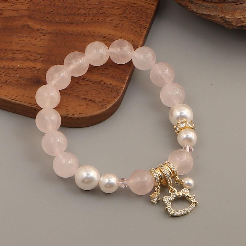 Natural pink crystal Shijia pearl pink love kt cat cross bamboo joint elastic stacked bracelet bracelet