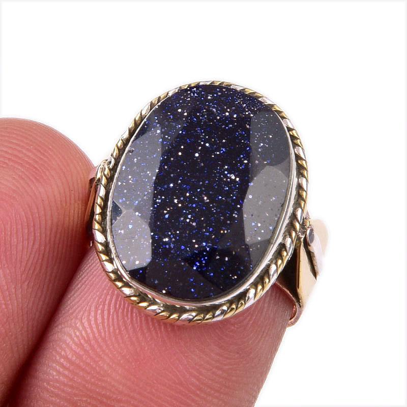 

Кольцо из двухцветного серебра 925 пробы с натуральным солнечным камнем S.5.5 a3I05