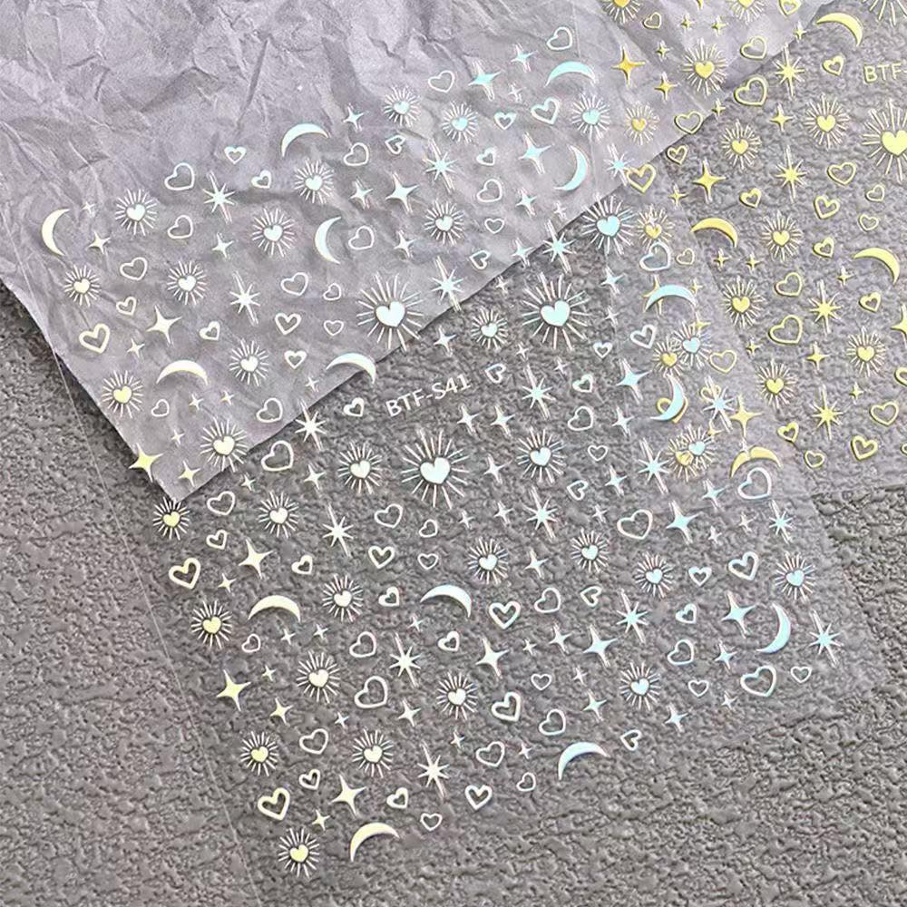 

Популярный набор мини-наклеек для ногтей в виде серебристых звездочек, сердечек, звезд и лун на самоклеящейся основе